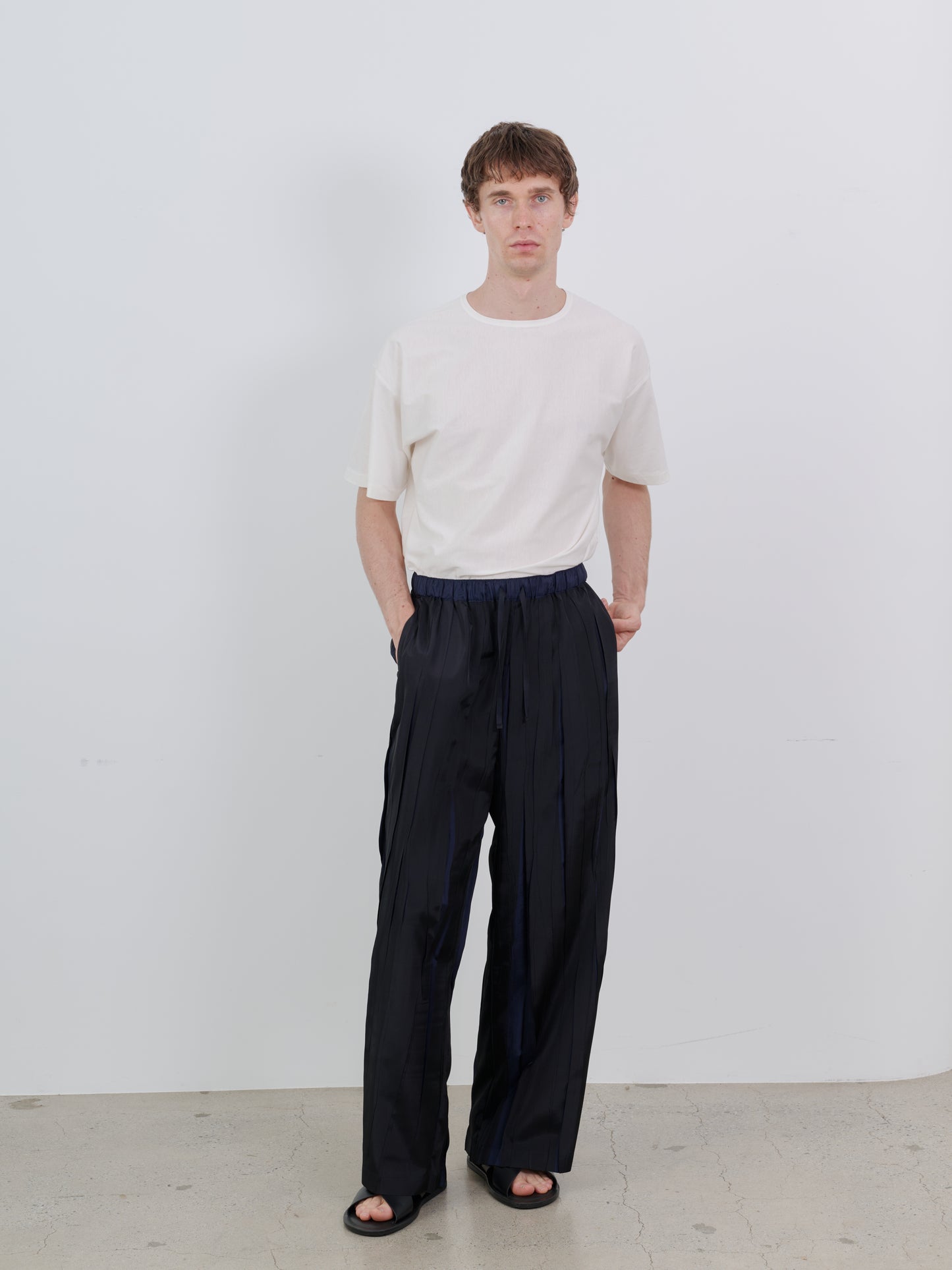 OVER PRINTED RANDOM PLEATS PANTS