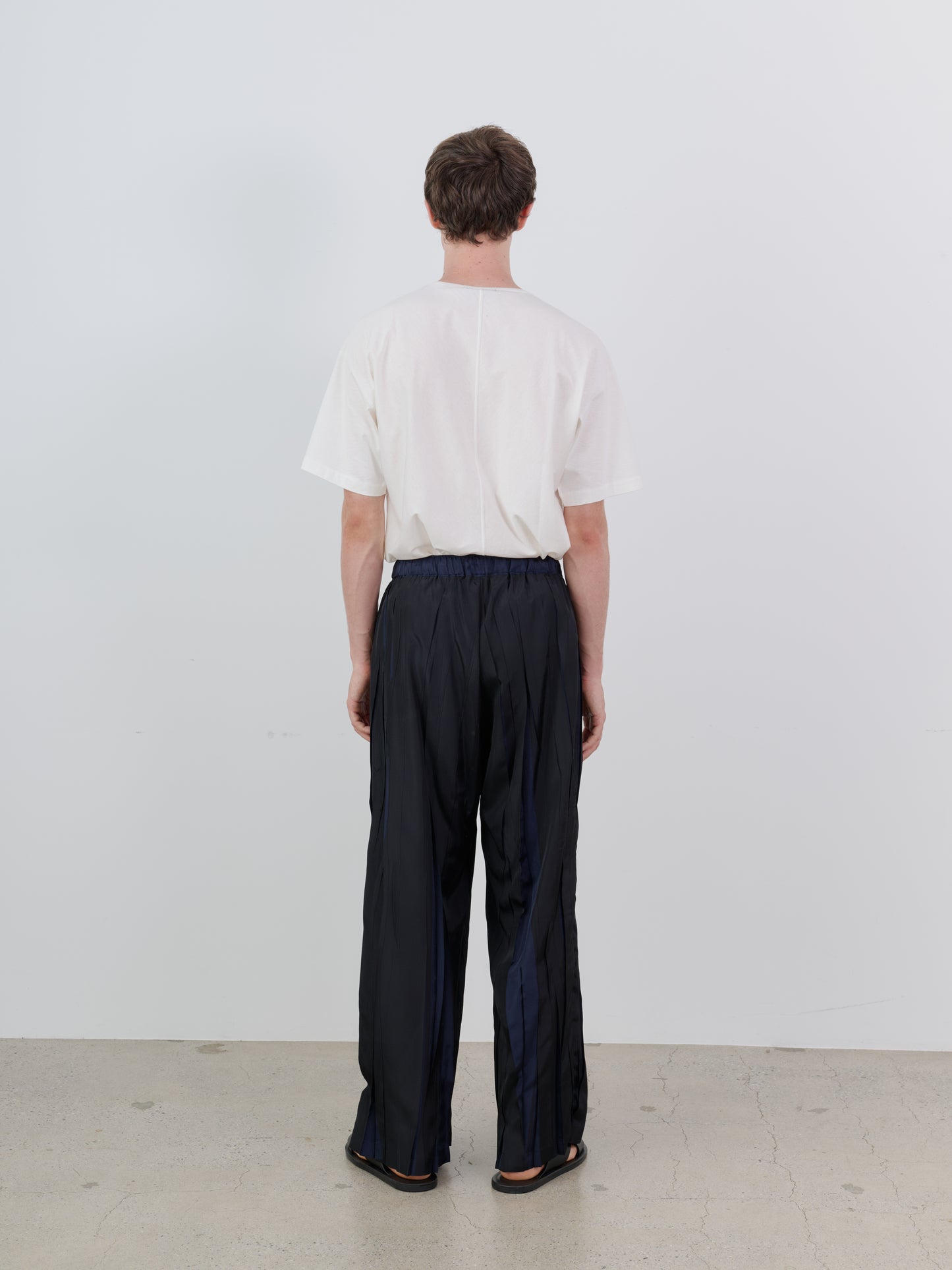 OVER PRINTED RANDOM PLEATS PANTS
